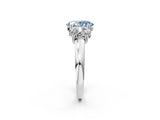 White gold Three-Stone Fancy Blue Oval Cut Cut Diamond Ring with Channel Set Band and Four-Prong Setting_26