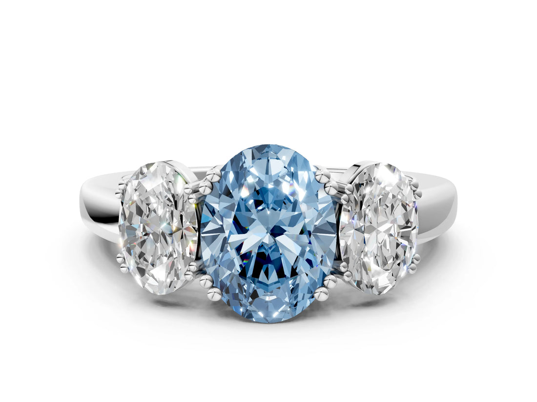 White gold Three-Stone Fancy Blue Oval Cut Cut Diamond Ring with Channel Set Band and Four-Prong Setting_48