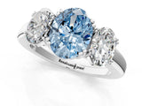 White gold Three-Stone Fancy Blue Oval Cut Cut Diamond Ring with Channel Set Band and Four-Prong Setting_49