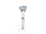 White gold Three-Stone Fancy Blue Oval Cut Cut Diamond Ring with Channel Set Band and Four-Prong Setting_50