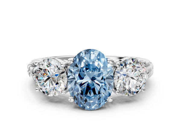 Platinum Three-Stone Fancy Blue Oval Cut Cut Diamond Ring with Channel-Set Band and Prong Setting