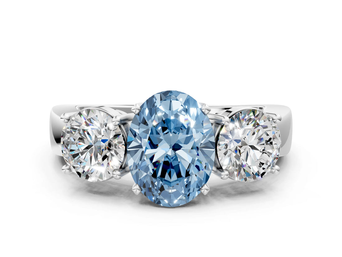 White gold Three-Stone Fancy Blue Oval Cut Diamond Ring with Round Side Stones, Classic Band, and Four-Prong Setting_66