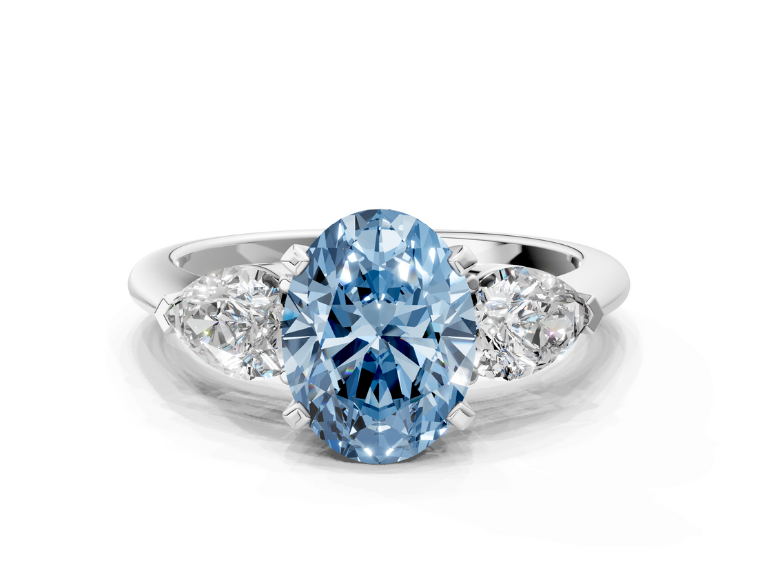 White gold Three-Stone Fancy Blue Oval  Diamond Ring with Pear Side Stones in Four-Prong Setting_38