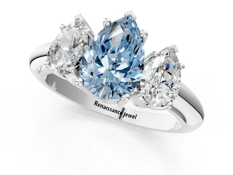White gold Three-Stone Fancy Blue Pear Cut Cut Diamond Engagement Ring with Prong Setting on a White Gold Band_13