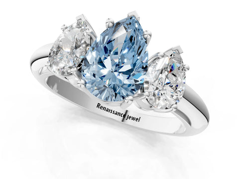 White gold Three-Stone Fancy Blue Pear Cut Cut Diamond Engagement Ring with Prong Setting on a White Gold Band_49