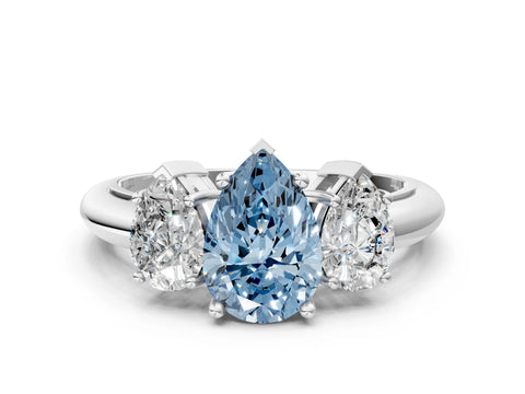 White gold Three-Stone Fancy Blue Pear Cut Cut Diamond Engagement Ring with Prong Setting on a White Gold Band_56