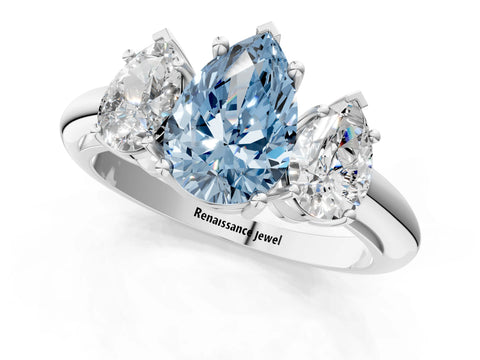 White gold Three-Stone Fancy Blue Pear Cut Cut Diamond Engagement Ring with Prong Setting on a White Gold Band_57