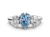 White gold Three-Stone Fancy Blue Pear Cut Cut Diamond Ring with Channel Set Band and Four-Prong Setting_12