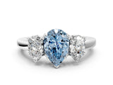 White gold Three-Stone Fancy Blue Pear Cut Cut Diamond Ring with Channel Set Band and Four-Prong Setting_36