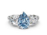 White gold Three-Stone Fancy Blue Pear Cut Cut Diamond Ring with Channel-Set Band and Prong Setting_12