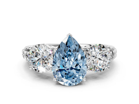 White gold Three-Stone Fancy Blue Pear Cut Cut Diamond Ring with Channel-Set Band and Prong Setting