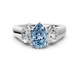 White gold Three-Stone Fancy Blue Pear Cut Cut Diamond Ring with Prong Setting and Classic Band
