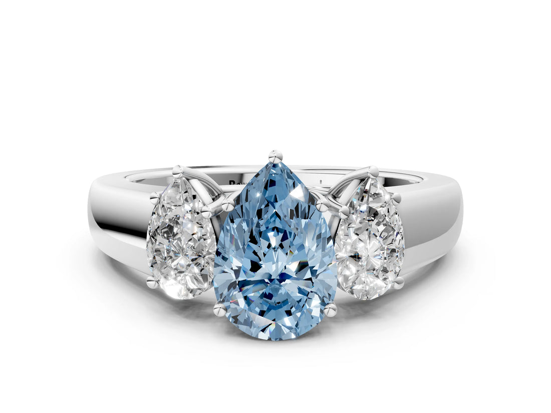 White gold Three-Stone Fancy Blue Pear Cut Cut Diamond Ring with Prong Setting and Classic Band