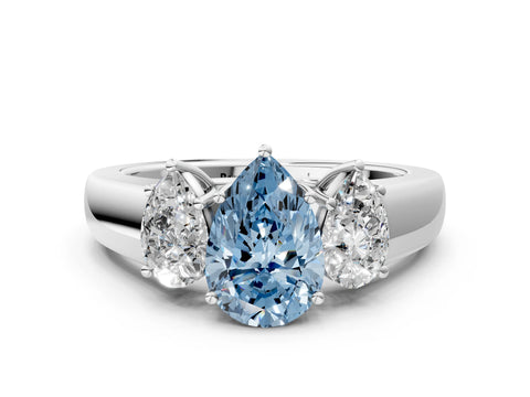 White gold Three-Stone Fancy Blue Pear Cut Cut Diamond Ring with Prong Setting and Classic Band