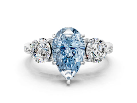 White gold Three-Stone Fancy Blue Pear Cut Diamond Channel Set Engagement Ring with Prong Setting