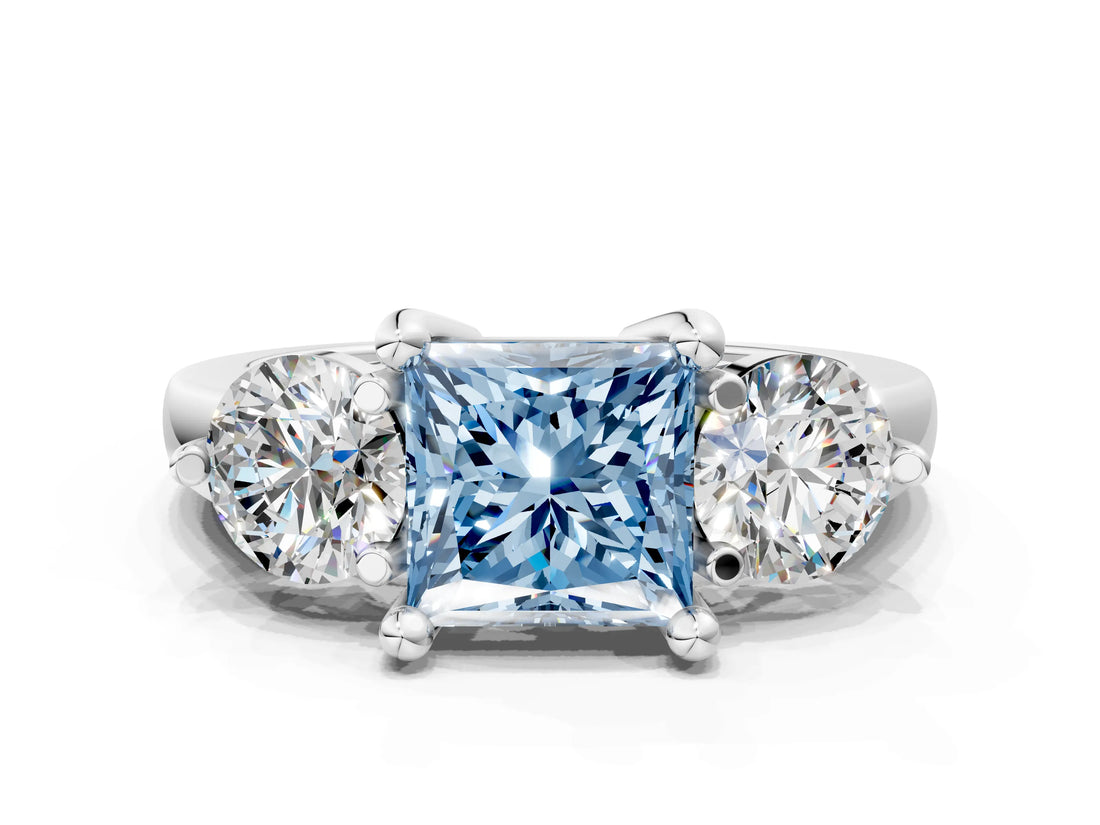 White gold Three-Stone Fancy Blue Princess  Brilliant Cut Solitaire Ring with Prong Setting on a Classic Band 1