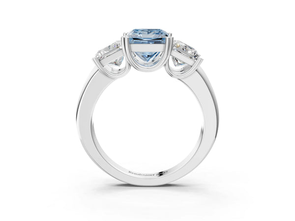 White gold Three-Stone Fancy Blue Princess Cut Cut Diamond Ring with Channel Set Band and Four-Prong Setting