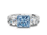 White gold Three-Stone Fancy Blue Princess Cut Cut Diamond Ring with Channel-Set Band and Prong Setting
