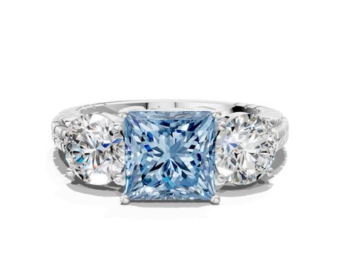 White gold Three-Stone Fancy Blue Princess Cut Cut Diamond Ring with Channel-Set Band and Prong Setting