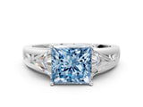 White gold Three-Stone Fancy Blue Princess Cut Cut Diamond Ring with Trillion Side Stones on a Split Shank Band_12