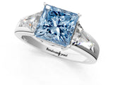White gold Three-Stone Fancy Blue Princess Cut Cut Diamond Ring with Trillion Side Stones on a Split Shank Band_13
