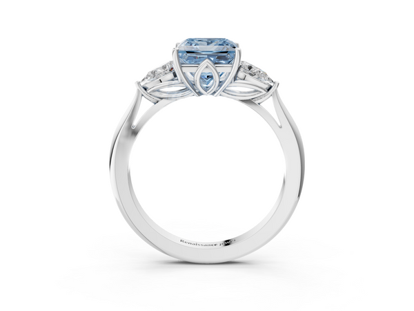 Platinum Three-Stone Fancy Blue Princess  Cut Diamond Ring with Pear Side Stones in Four-Prong Setting