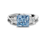 White gold Three-Stone Fancy Blue Princess Cut Diamond Ring with Pear  Side Stones in Four-Prong Setting_48