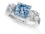 White gold Three-Stone Fancy Blue Princess Cut Diamond Ring with Round Side Stones, Classic Band, and Four-Prong Setting_1