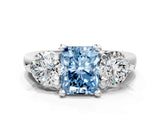 White gold Three-Stone Fancy Blue Radiant  Brilliant Cut Solitaire Ring with Prong Setting on a Classic Band 1