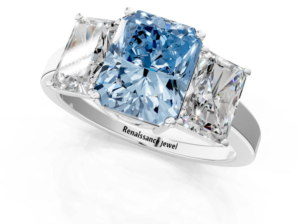 Platinum Three-Stone Fancy Blue Radiant Cut Cut Diamond Engagement Ring with Flat Band and Four-Prong Setting