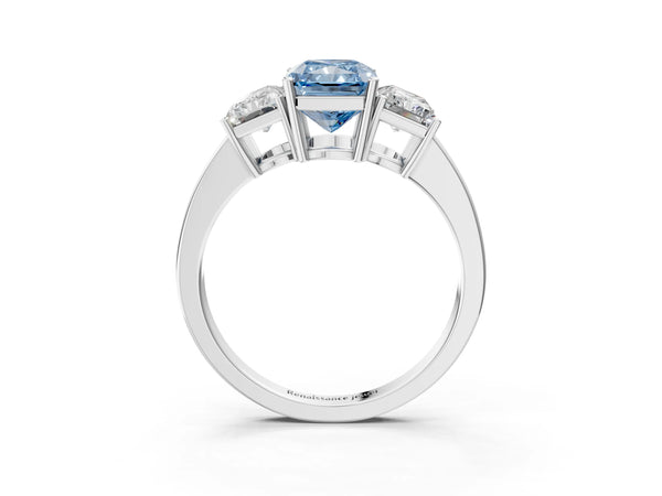 Platinum Three-Stone Fancy Blue Radiant Cut Cut Diamond Engagement Ring with Flat Band and Four-Prong Setting