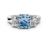 White gold Three-Stone Fancy Blue Radiant Cut Cut Diamond Ring with Channel Set Band and Four-Prong Setting_54