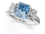 White gold Three-Stone Fancy Blue Radiant Cut Cut Diamond Ring with Channel Set Band and Four-Prong Setting_55