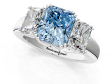 White gold Three-Stone Fancy Blue Radiant Cut Cut Diamond Ring with Channel Set Band and Four-Prong Setting_97