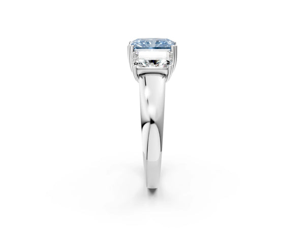Platinum Three-Stone Fancy Blue Radiant Cut Cut Diamond Ring with Channel Set Band and Four-Prong Setting