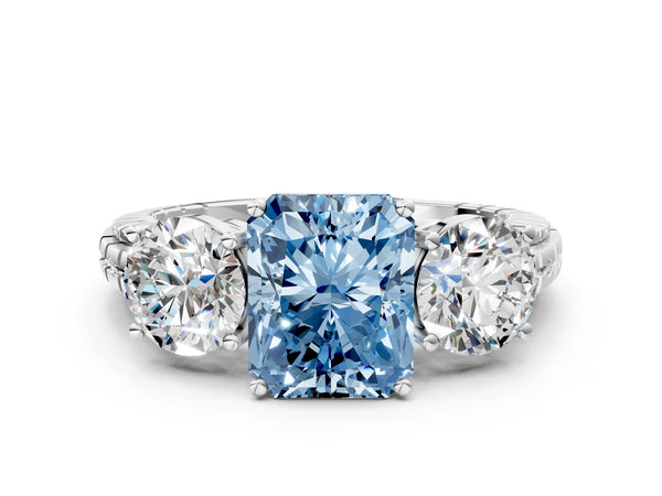 Platinum Three-Stone Fancy Blue Radiant Cut Cut Diamond Ring with Channel-Set Band and Prong Setting