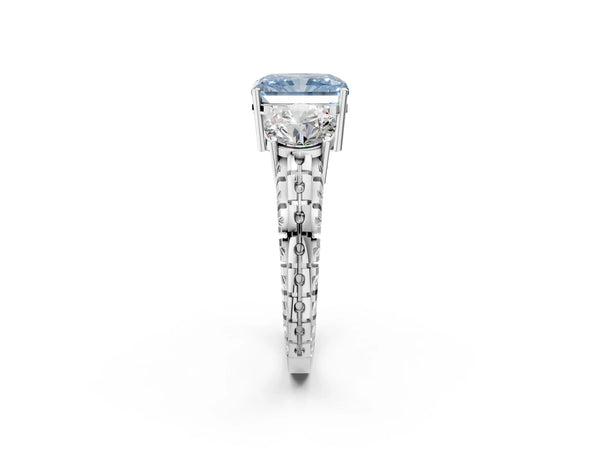 Platinum Three-Stone Fancy Blue Radiant Cut Cut Diamond Ring with Channel-Set Band and Prong Setting