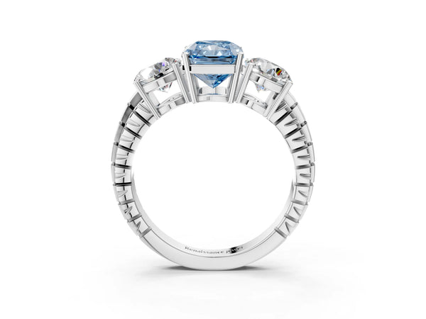 Platinum Three-Stone Fancy Blue Radiant Cut Cut Diamond Ring with Channel-Set Band and Prong Setting