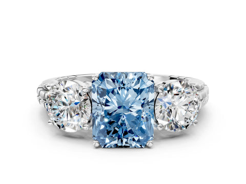 White gold Three-Stone Fancy Blue Radiant Cut Cut Diamond Ring with Channel-Set Band and Prong Setting