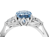 White gold Three-Stone Fancy Blue Radiant  Cut Diamond Ring with Pear Side Stones in Four-Prong Setting_113