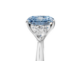 White gold Three-Stone Fancy Blue Radiant  Cut Diamond Ring with Pear Side Stones in Four-Prong Setting_114