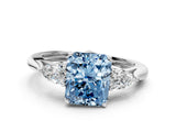 White gold Three-Stone Fancy Blue Radiant Cut Diamond Ring with Pear  Side Stones in Four-Prong Setting_12