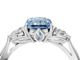White gold Three-Stone Fancy Blue Radiant Cut Diamond Ring with Pear  Side Stones in Four-Prong Setting_16