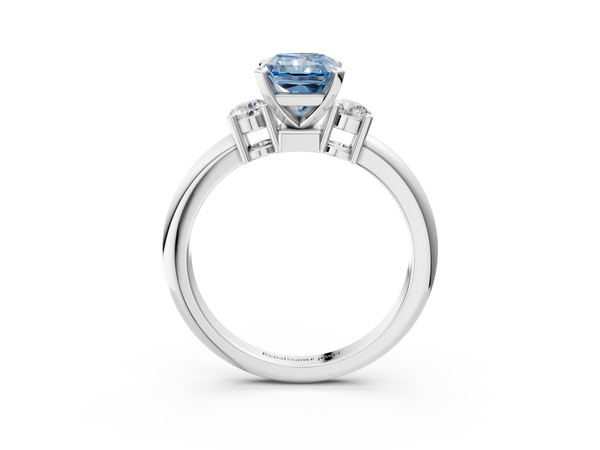 Platinum Three-Stone Fancy Blue Radiant  Cut Diamond Solitaire with Prong Setting and Classic Band