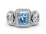 White gold Three-Stone Fancy Blue Radiant Cut Halo Diamond Milgrain Band with Four-Prong Setting