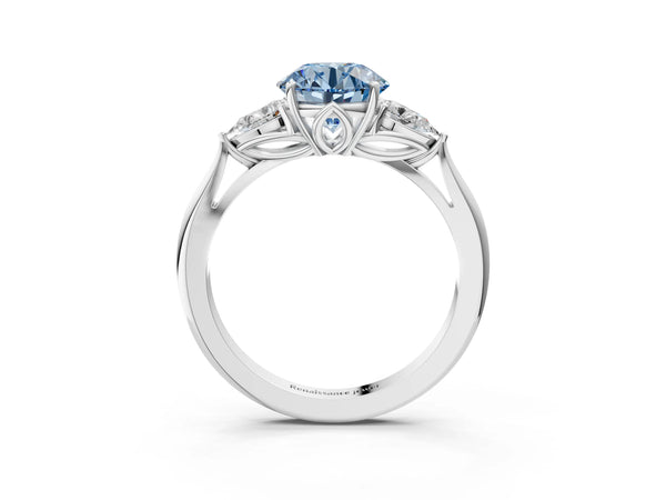 Platinum Three-Stone Fancy Blue Round Cut Brilliant Diamond Solitaire Ring with Tapered Band and Four-Prong Setting