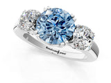 White gold Three-Stone Fancy Blue Round Cut Cut Diamond Ring with Channel Set Band and Four-Prong Setting_37