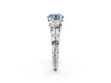 White gold Three-Stone Fancy Blue Round Cut Cut Diamond Ring with Channel-Set Band and Prong Setting_2