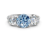 White gold Three-Stone Fancy Blue Round Cut Cut Diamond Ring with Channel-Set Band and Prong Setting