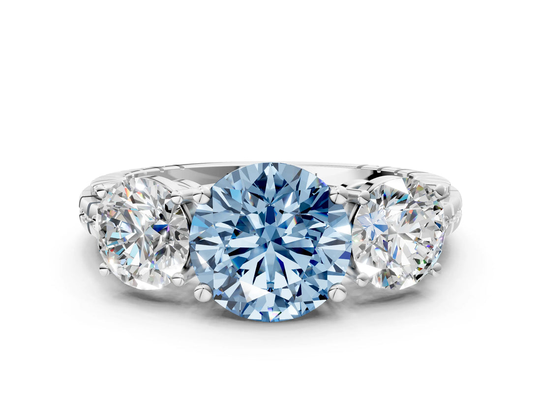 White gold Three-Stone Fancy Blue Round Cut Cut Diamond Ring with Channel-Set Band and Prong Setting